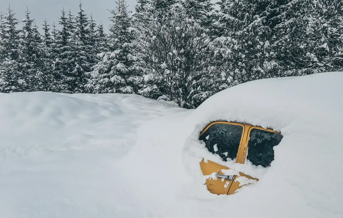 Yellow Car Buried in the Snow