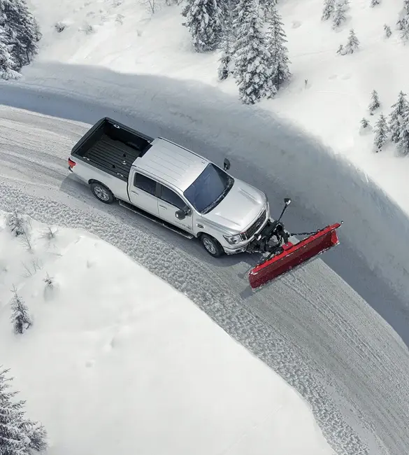 Nissan Titan Plowing Snow