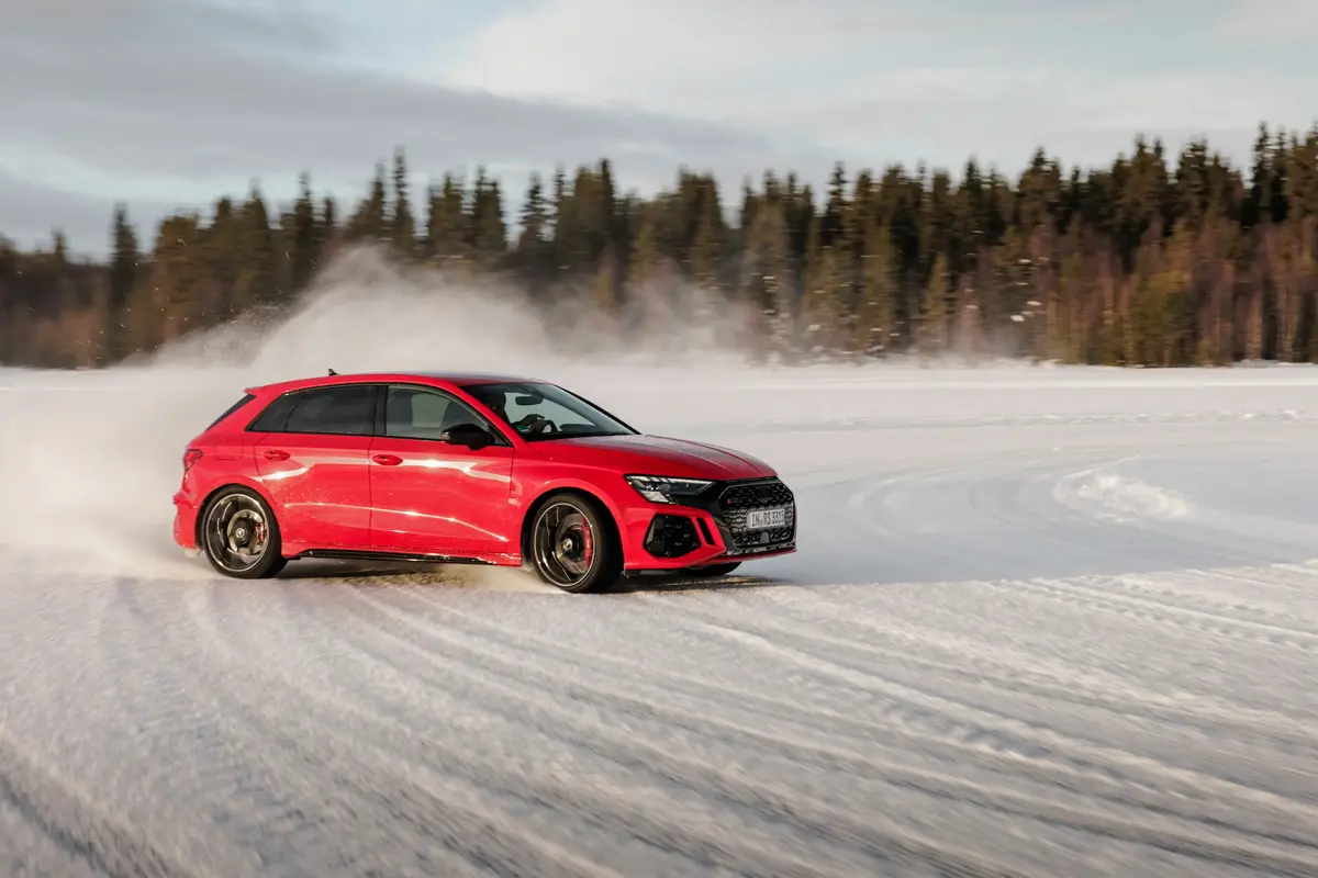 Red Audi RS3 in Snow