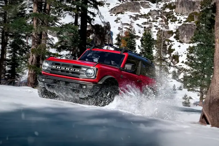 Red Ford Bronco tackle Deep Snow